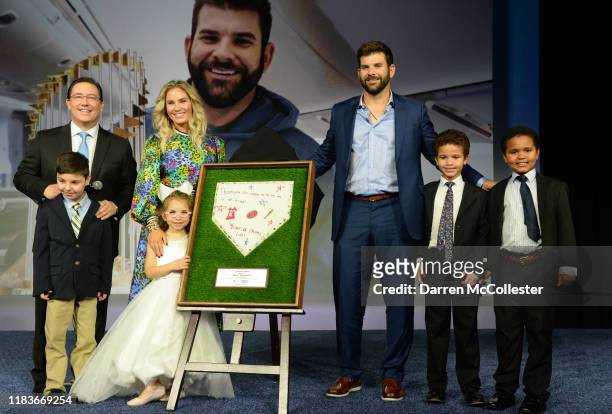 Mitch Moreland receives the Champions for Children's Award, with wife Susannah, and help from Brody, Claire, Trace, Logan, and Dave O'Brien at...