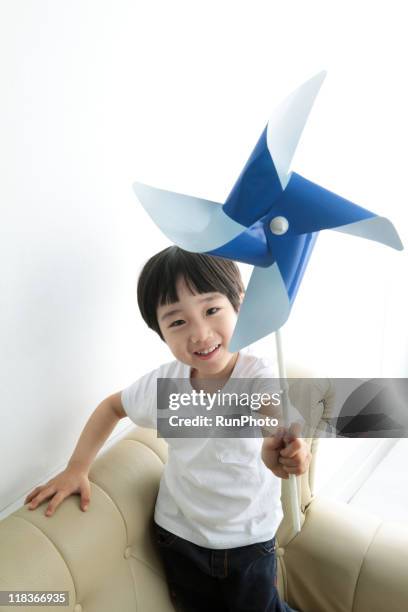 Windmill Boy Boy Paper Windmill Photos and Premium High Res Pictures - Getty Images
