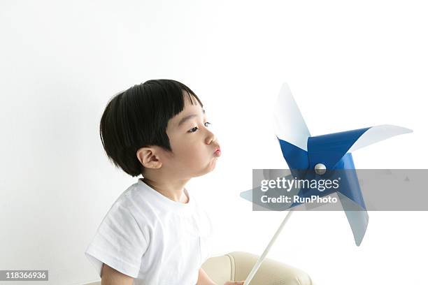 Windmill Boy 757 Boy Paper Windmill Stock Photos, High-Res Pictures, and Images ...