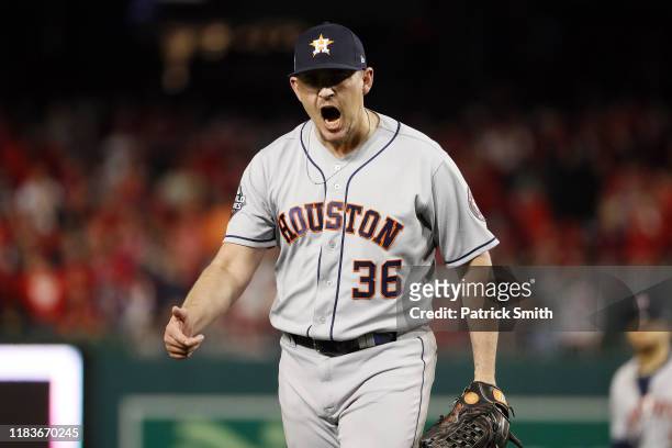 Will Harris of the Houston Astros celebrates after retiring the side in the sixth inning against the Washington Nationals in Game Four of the 2019...