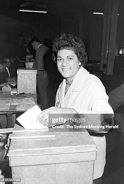 An Aboriginal woman casts her vote during the 1967 referendum at a polling booth at Sydney Town Hall. A sweeping majority of Australians, more than...