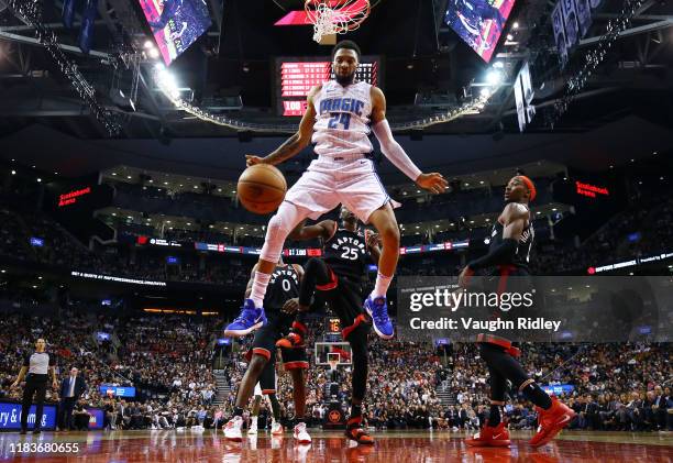 Khem Birch of the Orlando Magic dunks the ball during the second half of an NBA game against the Toronto Raptors at Scotiabank Arena on November 20,...