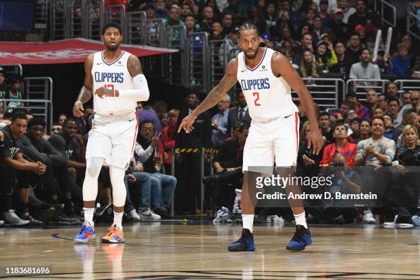 Paul George, and Kawhi Leonard of the LA Clippers on guard during the game against the Boston Celtics on November 20, 2019 at STAPLES Center in Los...