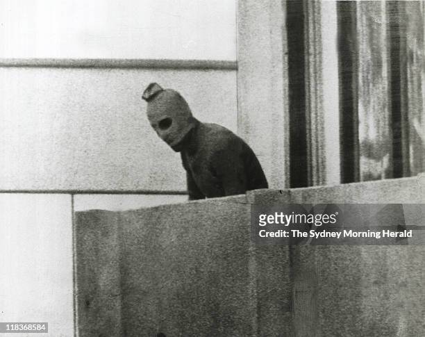 Fairfax photographer captured one of the defining images of the Munich Olympics in 1972. This Palestinian is one of a group that had taken 12 Israeli...