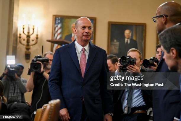 Gordon Sondland, the U.S. Ambassador to the European Union, returns to the hearing room after a break from testifying before the House Intelligence...