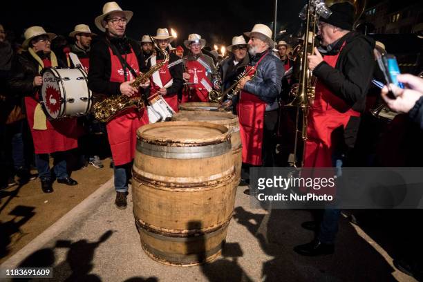 Traditional torchlight march followed by the breakthrough of the first barrel of Beaujolais Nouveau wine in Lyon, France, on November 21, 2019. A...