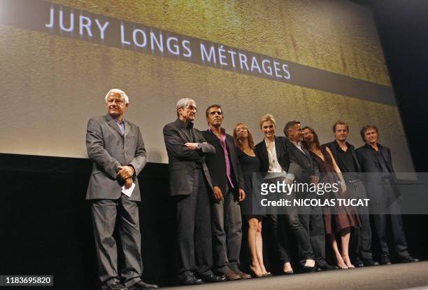 French director Claude Lelouch , who heads the 25th Cognac international thriller and film noir festival, addresses the audience, flanked by Lionel...