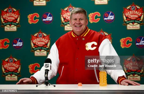 Head coach Bill Peters of the Calgary Flames speaks at the post game press conference after the 2019 Tim Hortons NHL Heritage Classic between the...