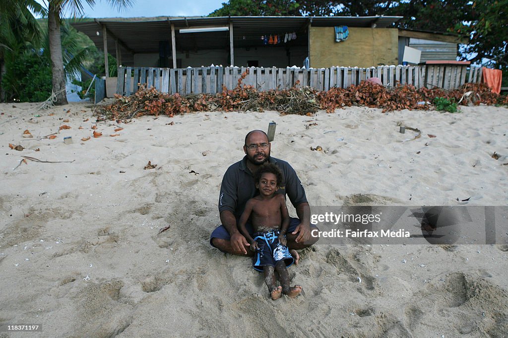 Sunny Passi with his son Kanai on Mer Island in the Torres Strait