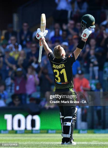 David Warner of Australia celebrates bringing up his century during the Twenty20 International match between Australia and Sri Lanka at Adelaide Oval...