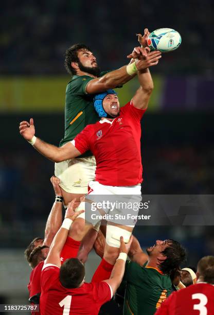 Lodewyk De Jager of South Africa competes for a line out ball with Justin Tipuric of Wales during the Rugby World Cup 2019 Semi-Final match between...