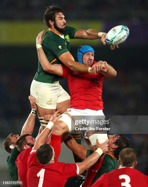 Lodewyk De Jager of South Africa competes for a line out ball with Justin Tipuric of Wales during the Rugby World Cup 2019 Semi-Final match between...