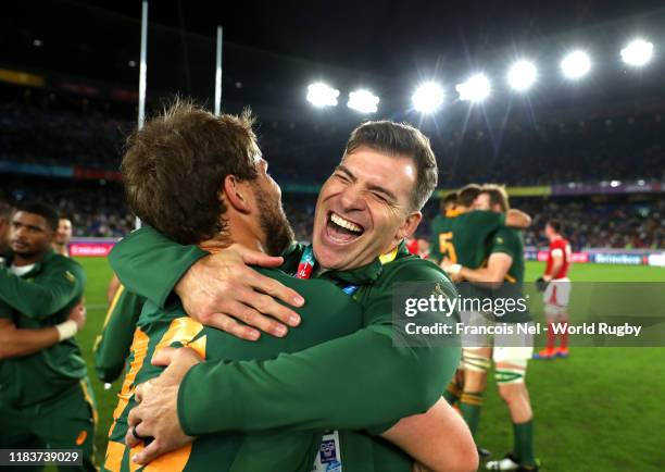 Schalk Brits of South Africa celebrates with teammate Frans Steyn following their team's victory in the Rugby World Cup 2019 Semi-Final match between...