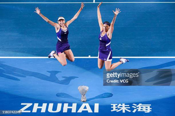 Lyudmyla Kichenok of the Ukraine and Andreja Klepac of Slovenia celebrate with the trophy after winning the Women's Doubles final match against Duan...