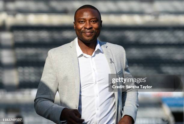 Ex Newcastle striker Shola Ameobi arrives for the Premier League match between Newcastle United and Wolverhampton Wanderers at St. James Park on...