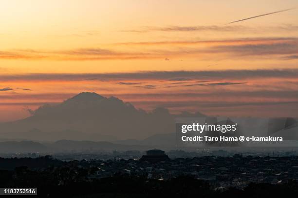 mt. fuji and residential district in kanagawa prefecture of japan - sunset contrail stock pictures, royalty-free photos & images