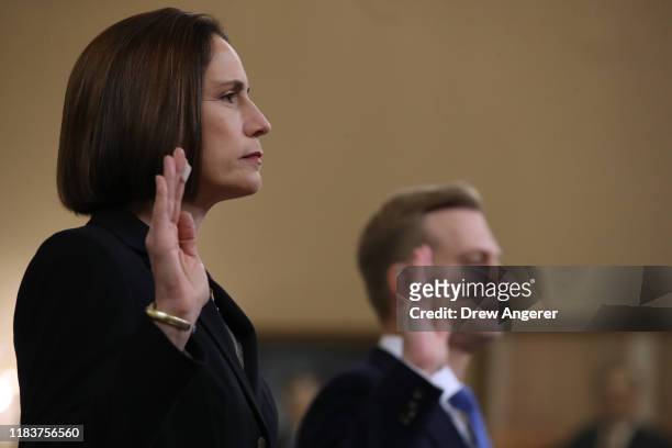 Fiona Hill, the National Security Council’s former senior director for Europe and Russia, and David Holmes, an official from the American embassy in...