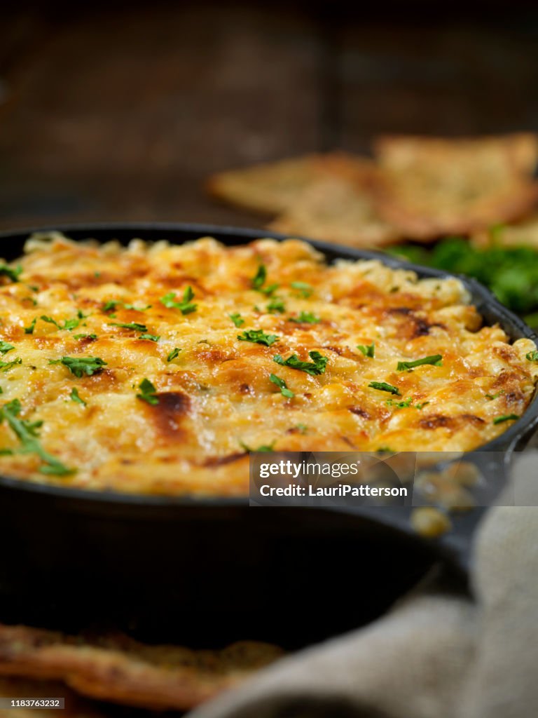 Baked Artichoke and Asiago Cheese Dip with Crispy Pita Chips