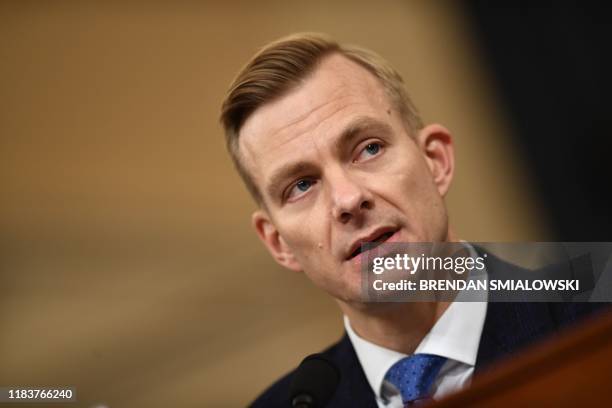 David Holmes, a State Department official stationed at the US Embassy in Ukraine testifies during the House Intelligence Committee hearing as part of...