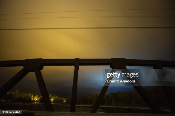 Aurora, known as the Northern Lights, Polar Lights, Aurora Borealis or Australis, Southern Lights etc. As seen behind a bridge at Santanoni Preserve...