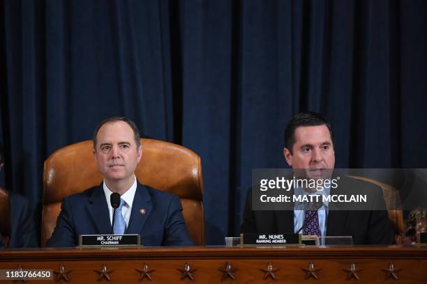 House Intelligence Committee chair, Adam Schiff looks on as Ranking Member Devin Nunes speaks, as Fiona Hill, the former top Russia expert on the...