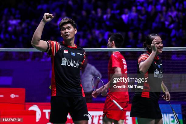 Praveen Jordan and Melati Daeva Oktavianti of Indonesia celebrate the victory in the Mixed Double final match against Zheng Siwei and Huang Yaqiong...