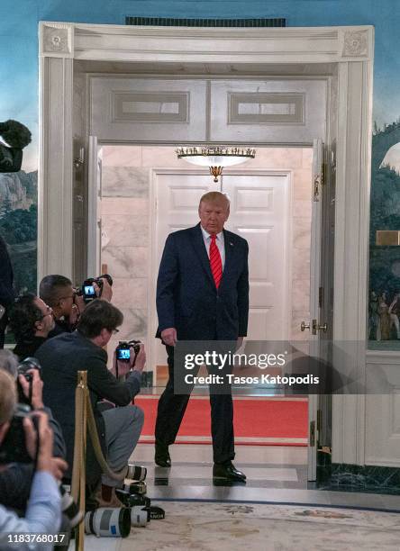 President Donald Trump enters the Diplomatic Reception Room of the White House to make a statement October 27, 2019 in Washington, DC. President...