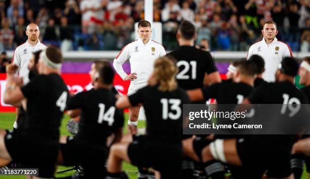 Owen Farrell of England faces the Haka before the Rugby World Cup 2019 Semi-Final match between England and New Zealand at International Stadium...