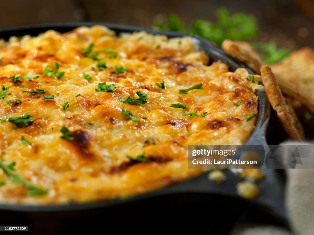 Baked Artichoke and Asiago Cheese Dip with Crispy Pita Chips