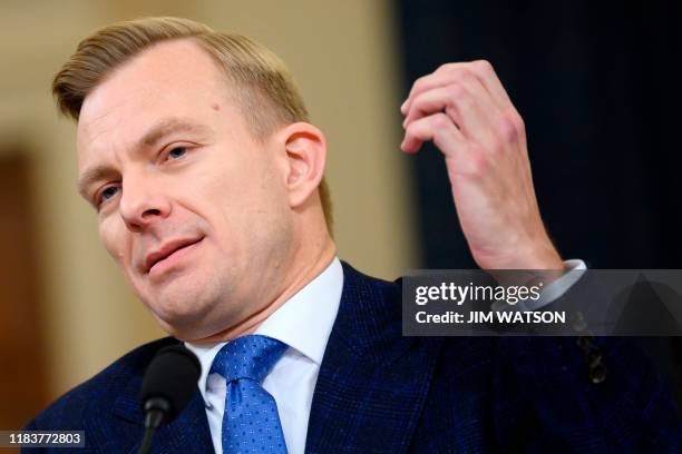 David Holmes, a State Department official stationed at the US Embassy in Ukraine testifies during the House Intelligence Committee hearing as part of...