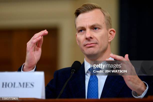 David Holmes, a State Department official stationed at the US Embassy in Ukraine testifies during the House Intelligence Committee hearing as part of...
