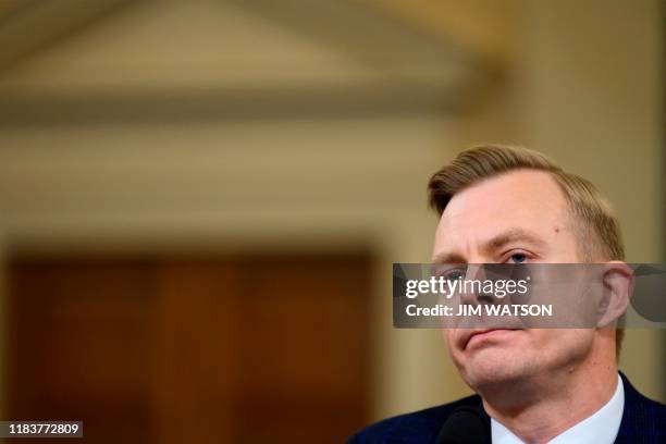 David Holmes, a State Department official stationed at the US Embassy in Ukraine testifies during the House Intelligence Committee hearing as part of...