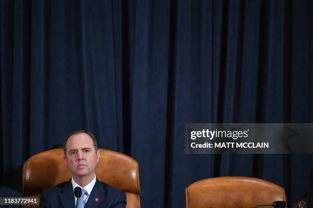 House Intelligence Committee chair, Adam Schiff listens as Fiona Hill, the former top Russia expert on the National Security Council, and David...