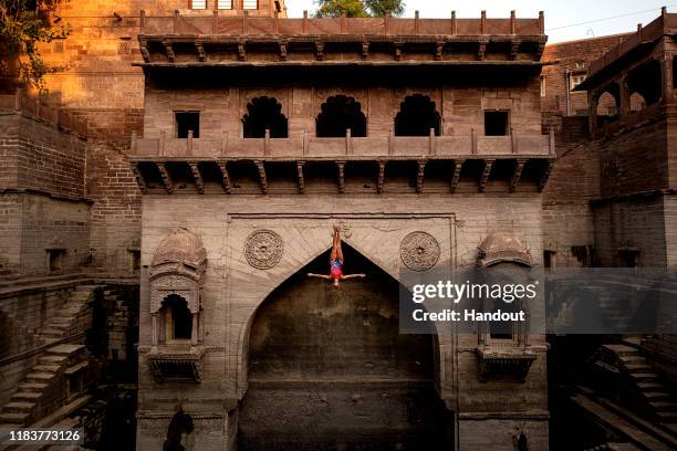 In this handout image provided by Red Bull, Red Bull Cliff Diving World Series reigning champion, Rhiannan Iffland of Australia, dives at the Toorji...