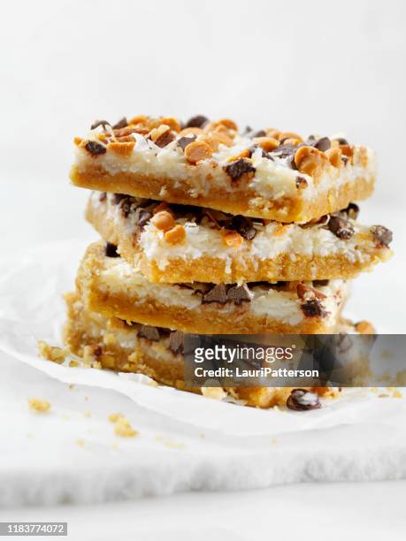 7 layer coconut dessert squares - coconut biscuits stock pictures, royalty-free photos & images