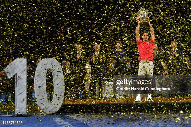 Roger Federer of Switzerland celebrates his 10th Swiss Indoors title during the final match of the Swiss Indoors ATP 500 tennis tournament against...