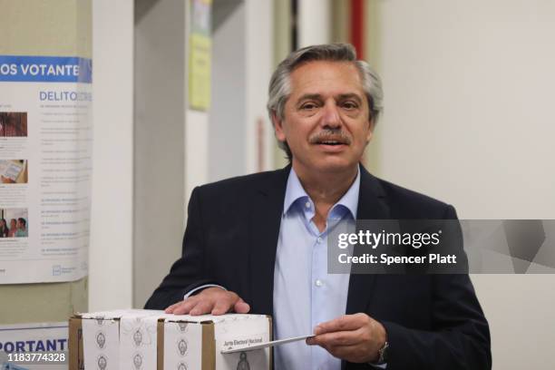 Presidential candidate Alberto Fernandez of 'Frente de Todos' casts his vote during the presidential elections in Argentina at Universidad Católica...