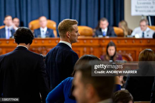 David Holmes, a State Department official stationed at the US Embassy in Ukraine leaves during a break during the House Intelligence Committee...