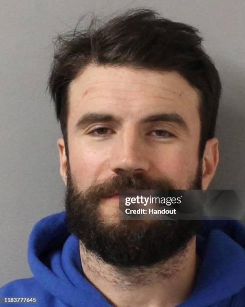 In this handout provided by the Davidson County Sheriff, country singer Sam Hunt poses for a mugshot image after being arrested on DUI charges...