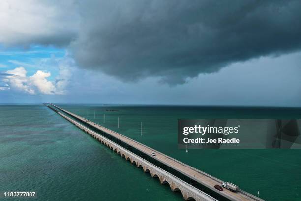 An aerial view from a drone shows part of the Seven Mile bridge running over the Strait of Florida on October 25, 2019 in Bahia Honda Key, Florida....