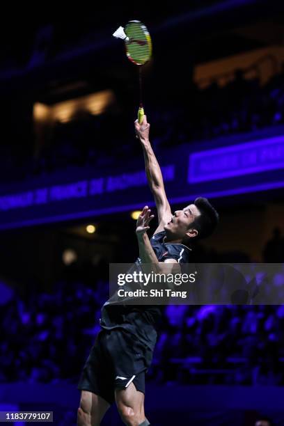 Chen Long of China competes in the Men's Single final match against Jonatan Christie of Indonesia on day six of the French Open at Stade Pierre de...