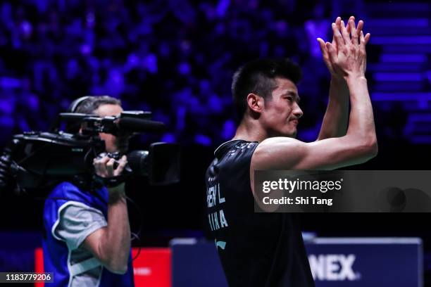 Chen Long of China greets the audience after the Men's Single final match against Jonatan Christie of Indonesia on day six of the French Open at...