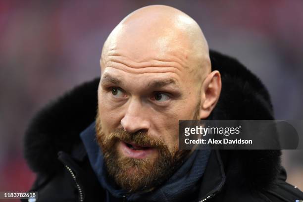 Boxer Tyson Fury looks on during the NFL game between Cincinnati Bengals and Los Angeles Rams at Wembley Stadium on October 27, 2019 in London,...