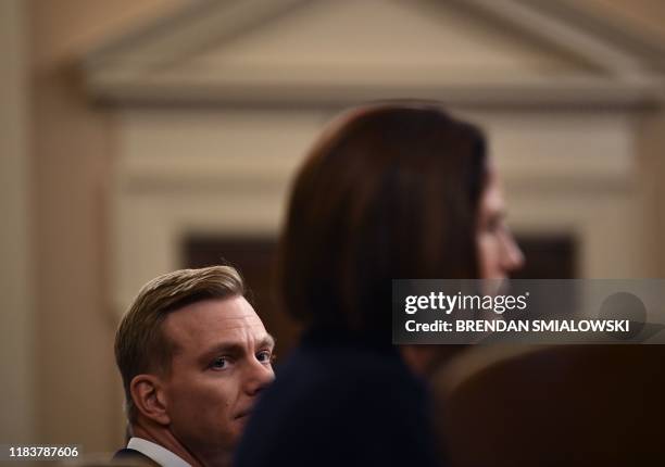 David Holmes, a State Department official stationed at the US Embassy in Ukraine, watches as Fiona Hill, the former top Russia expert on the National...