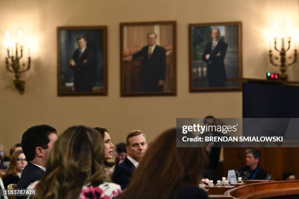 David Holmes , a State Department official stationed at the US Embassy in Ukraine, watches as Fiona Hill, the former top Russia expert on the...