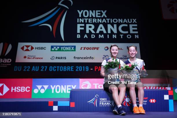 Lee So Hee and Shin Seung Chan of Korea pose with their trophies after the Women's Double final match against Kim So Yeong and Kong Hee Yong of Korea...