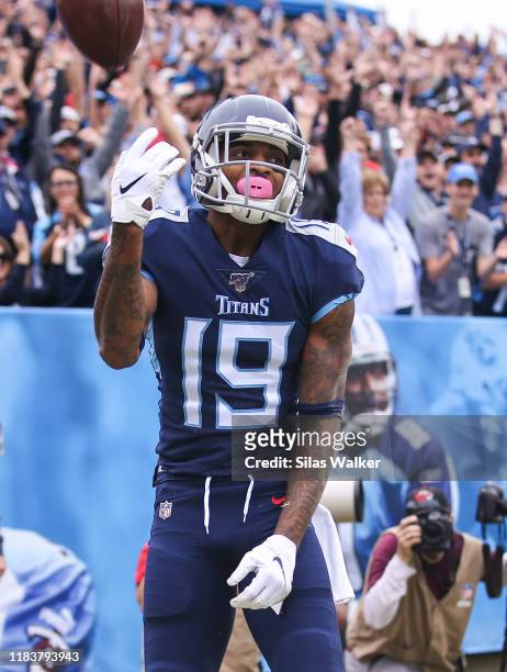 Tajae Sharpe of the Tennessee Titans celebrates after scoring a touchdown against the Tampa Bay Buccaneers during the first quarter of the game at...