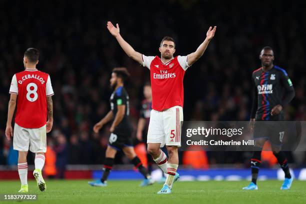 Sokratis Papastathopoulos of Arsenal reacts to having his team's third goal disallowed following a VAR check during the Premier League match between...