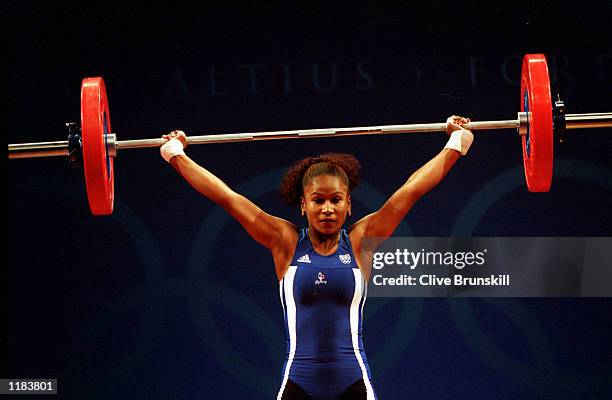 Sabrina Richard of France lifts during the Womens 48 kilogram Weightlifting Snatch event at the Sydney Convention and Exhibition Centre in Darling...