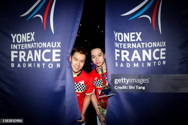 Marcus Fernaldi Gideon and Kevin Sanjaya Sukamuljo of Indonesia pose with their trophies after the Men's Double final match against Satwiksairaj...